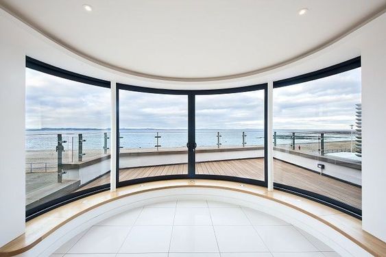 Large Spaces and Curved Windows